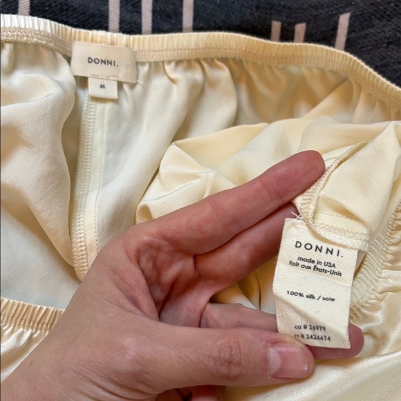 DONNI. Silk Tap Shorts in Light Yellow - Picture 13 of 17